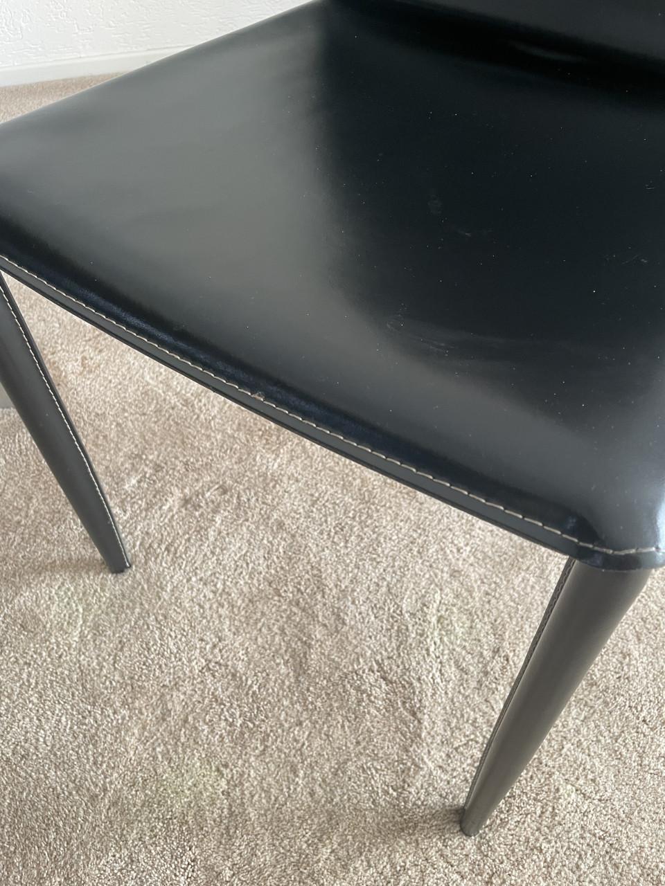 Eethoek (houten tafel 2 meter en leren stoelen)
