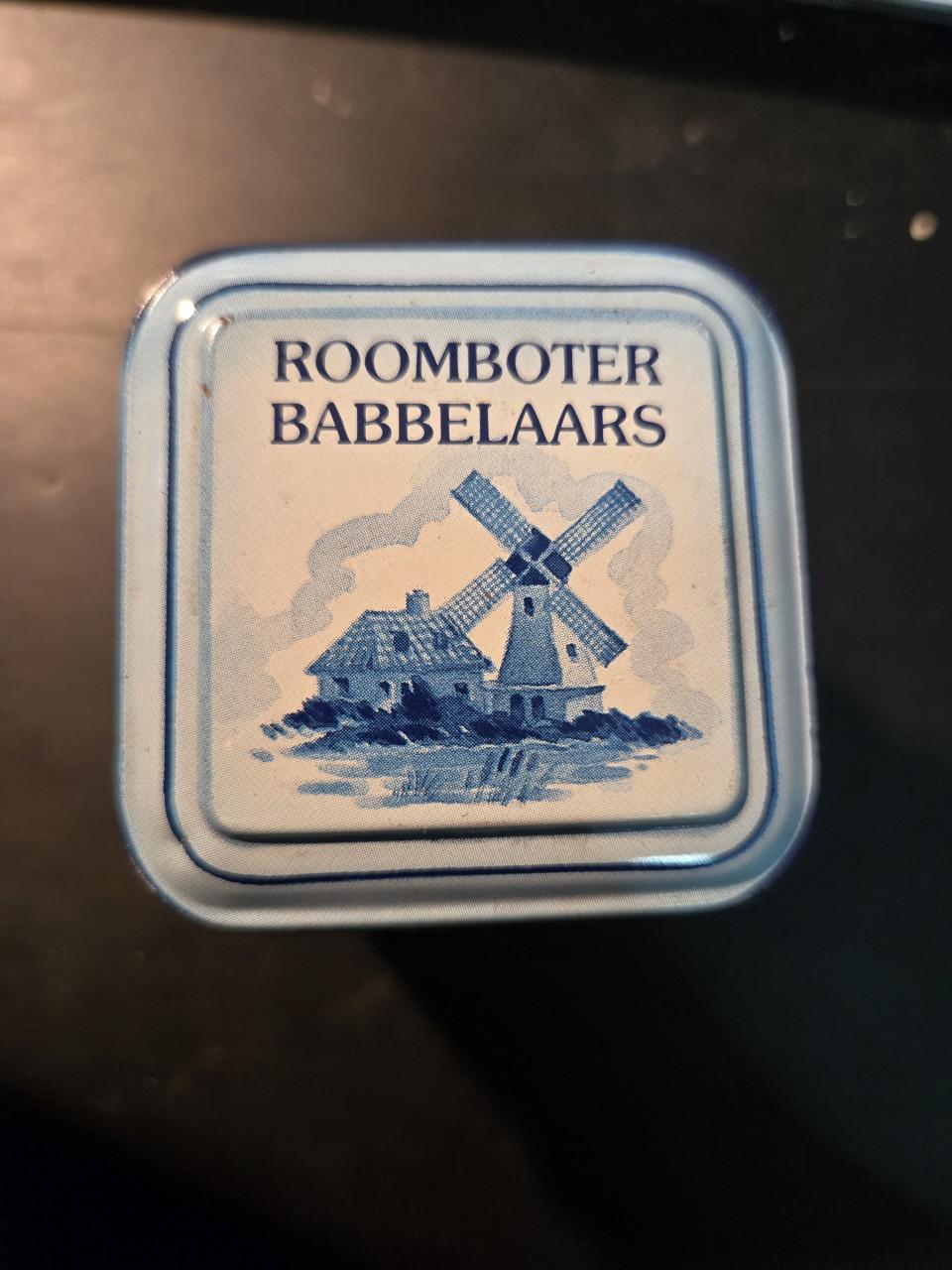 Delfst blauw blikje van roomboter babbelaars, leeg