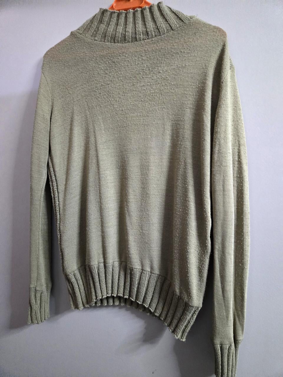 Beige vintage trui met een klassieke V-hals en een  kabelbreipatroon