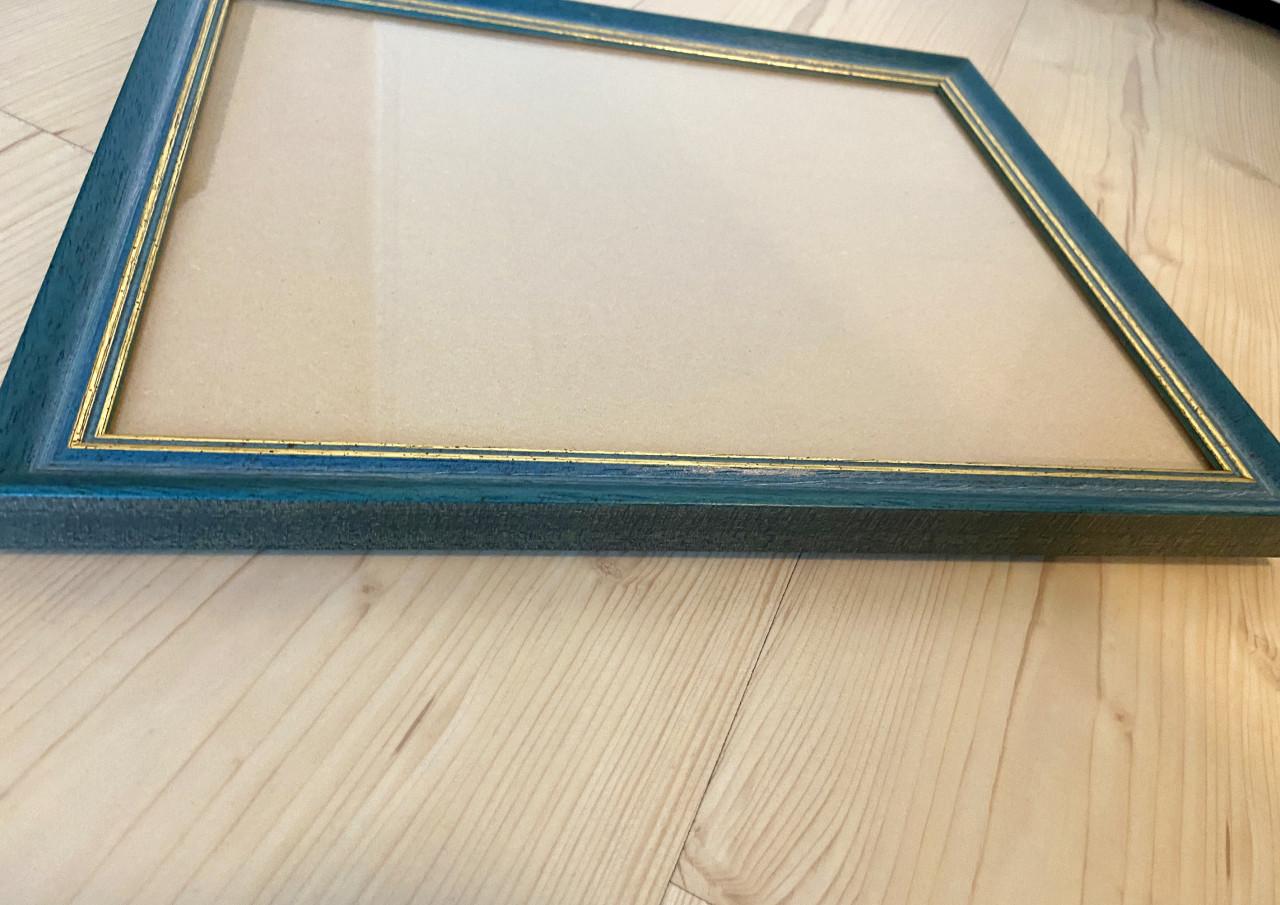 Mooie blauw/goud gekleurde fotolijsten