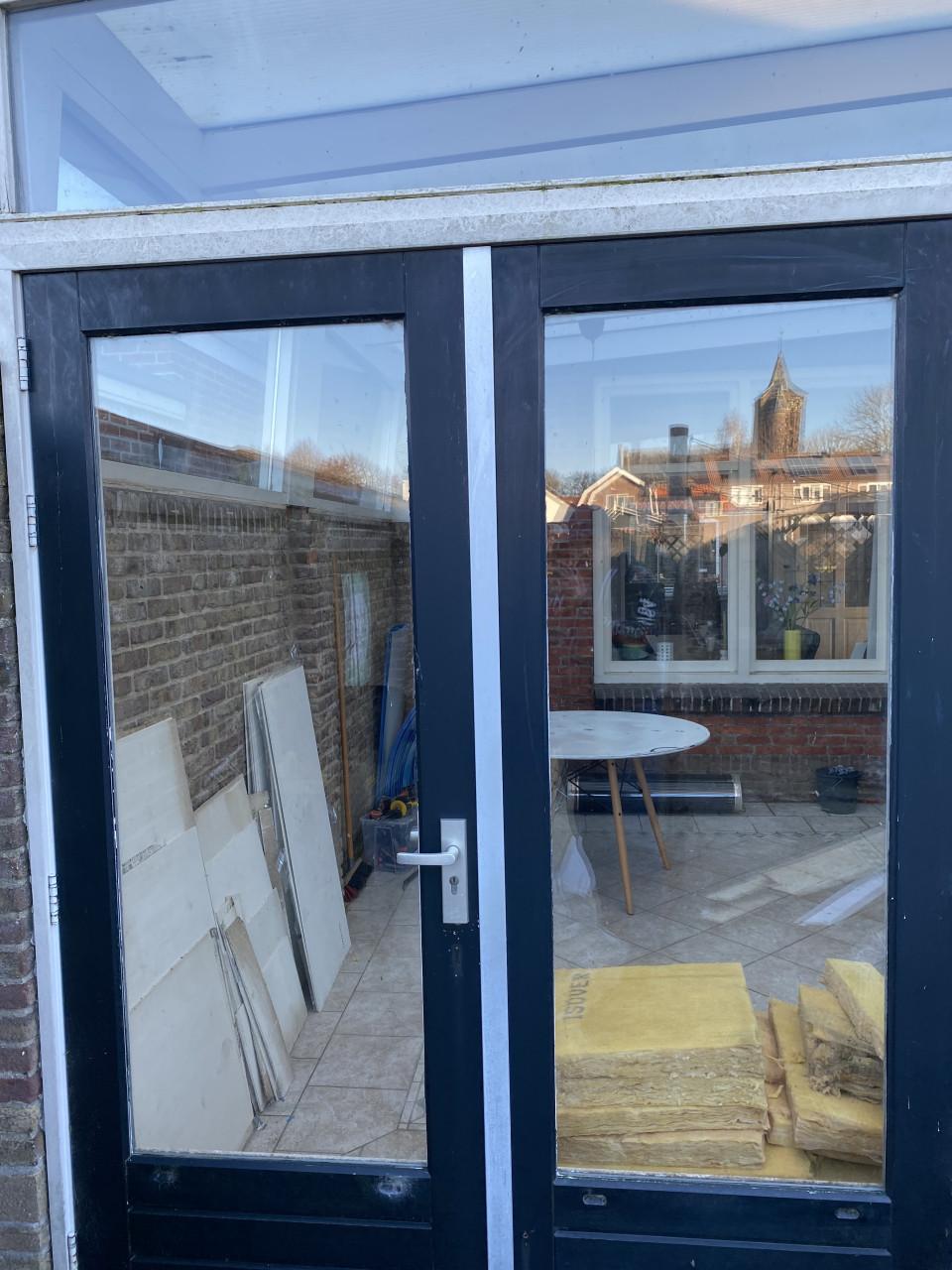 Openslaande houten tuin deuren met kozijn