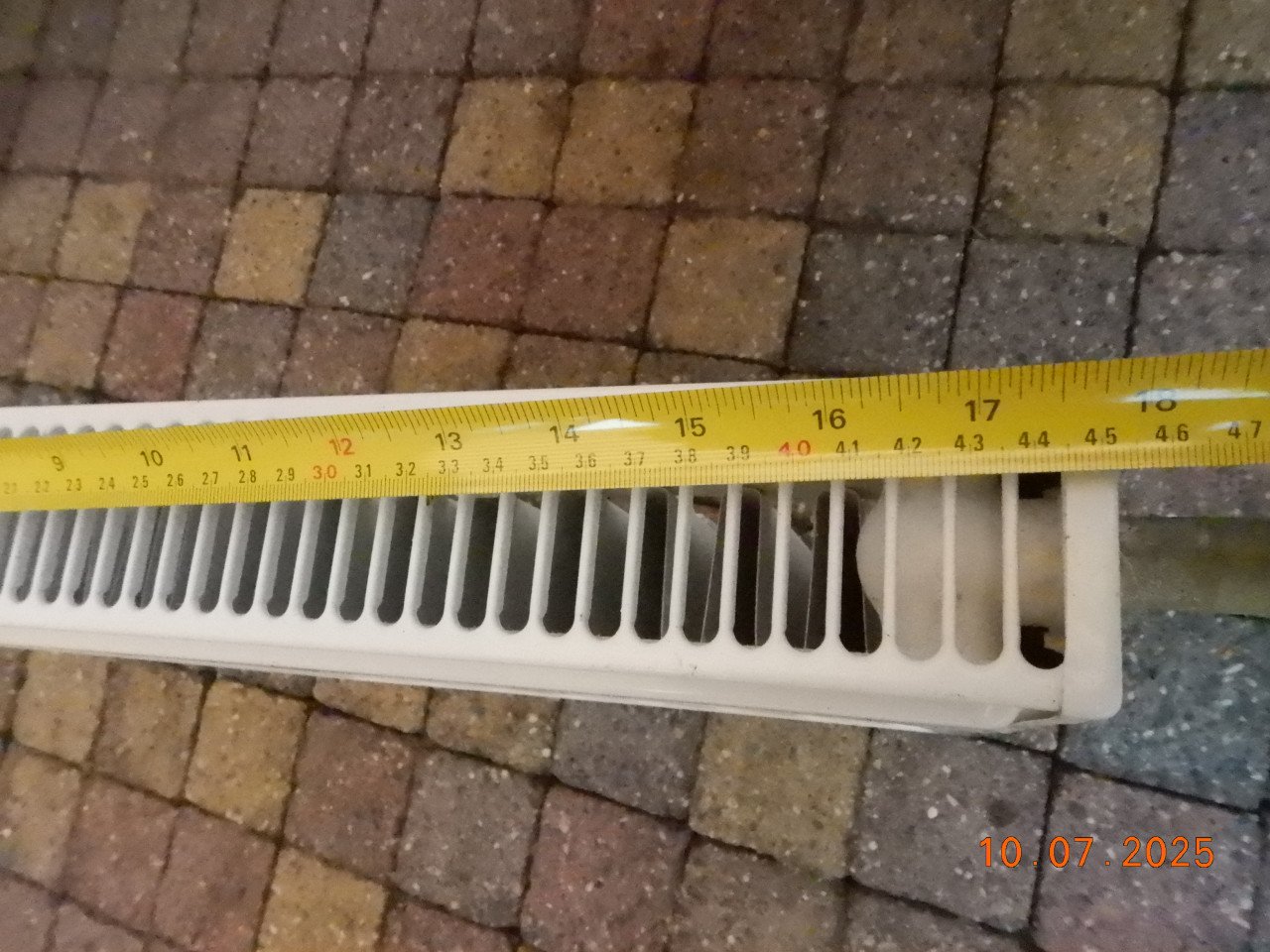 Kleine radiator voor in wc of badkamer