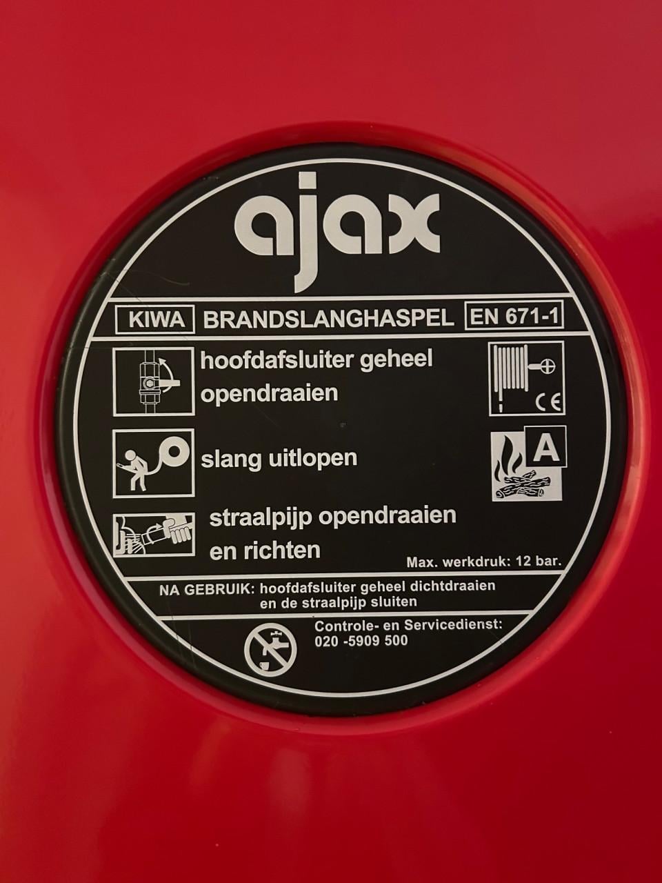 Te koop : Brandslang van Ajax op haspel