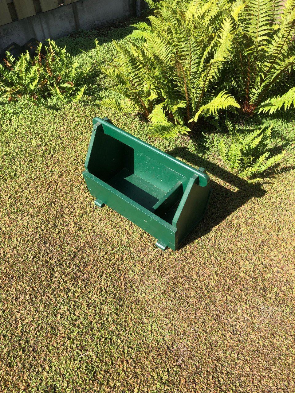 Groene houten bak.