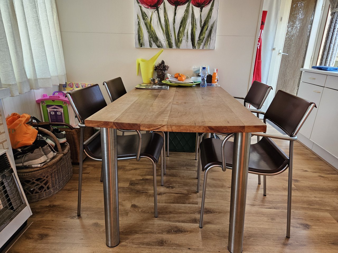 4 RVS en lederen eetkamerstoelen