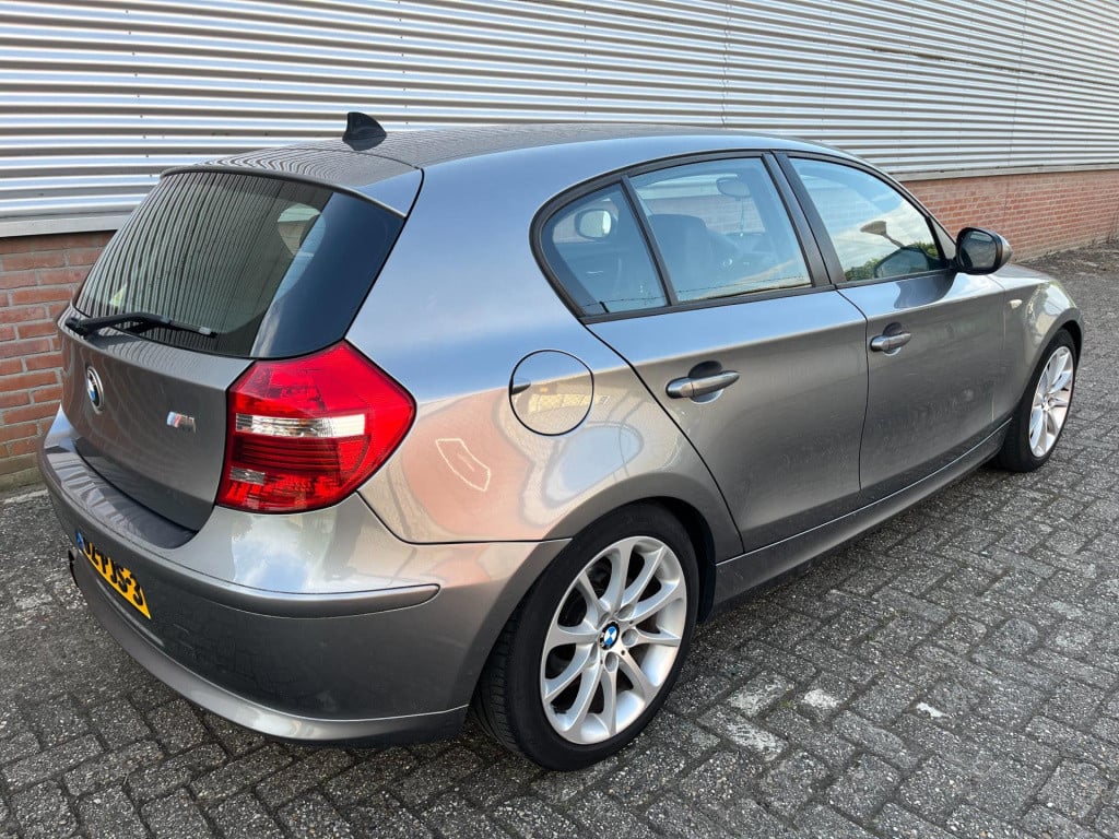 BMW 1 Serie 116i business line ultimate edition | m pakket | leder | trekha