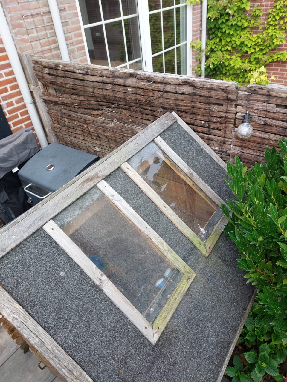 Houten kinderspeelhuisje