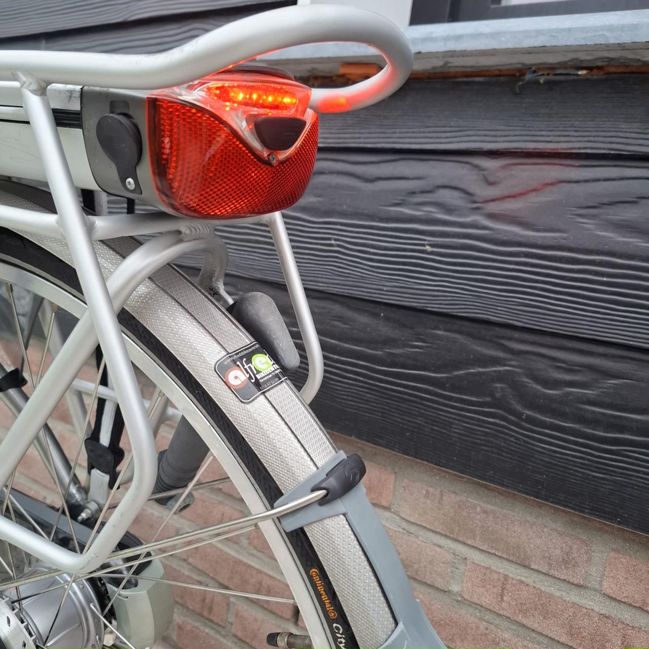 Gazelle orange elektrische dames fiets (met grap)