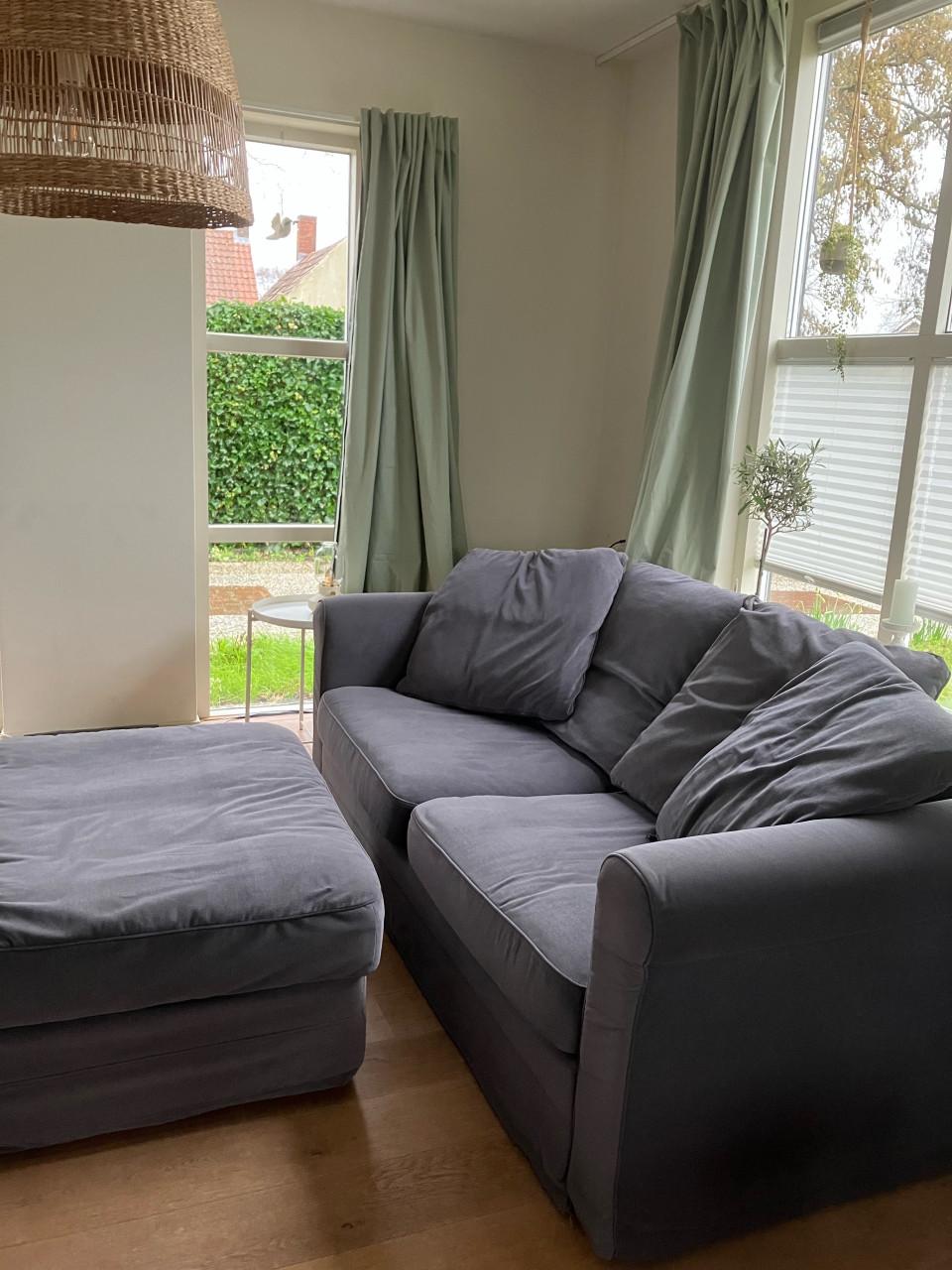 Ikea Gronlid slaapbank, fauteuil, en opbergmeubel middengrijs en ronde poef