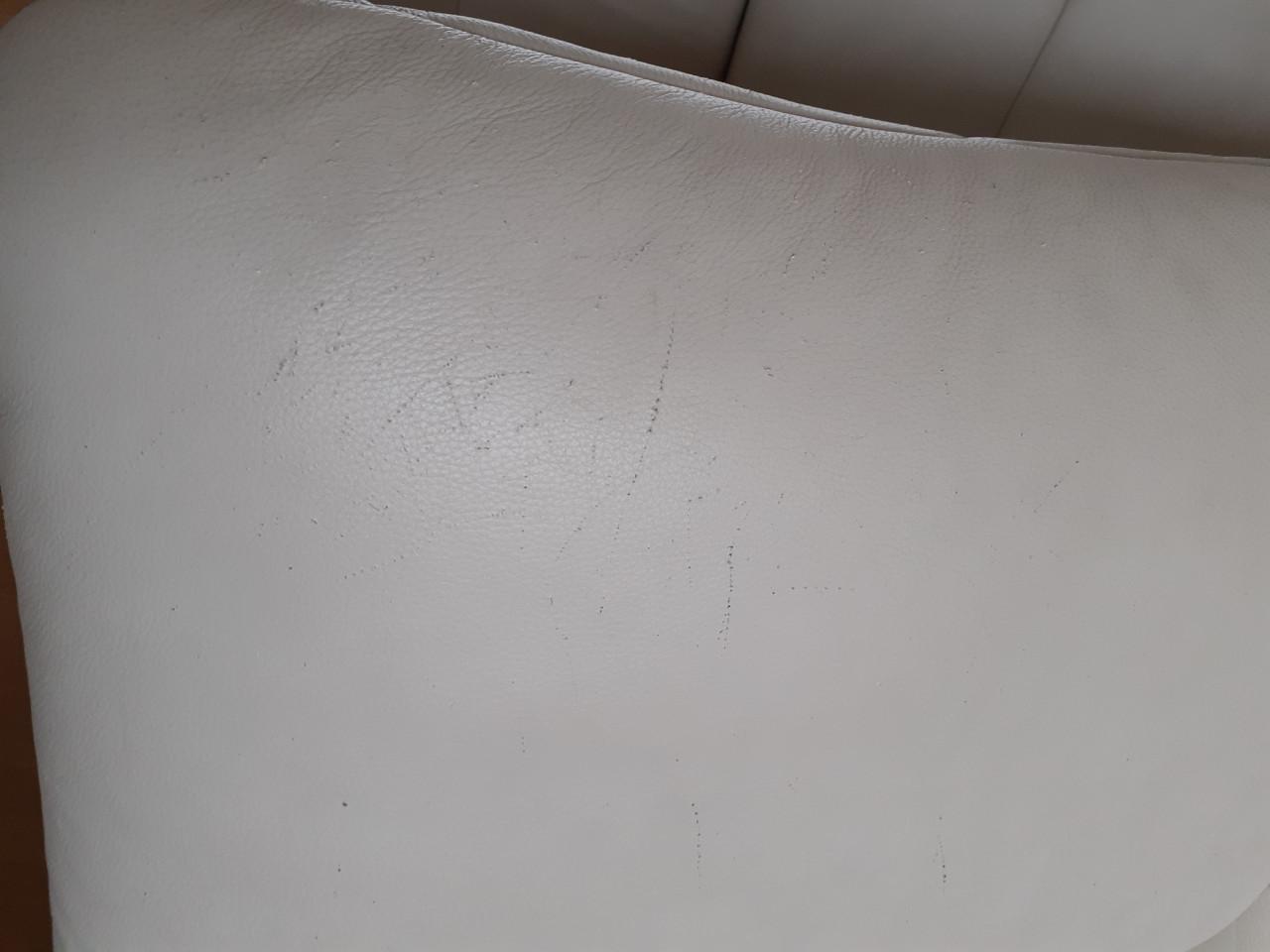 Crème-witte lederen Ergoline tweezitbank en comfortabele Montel fauteuil