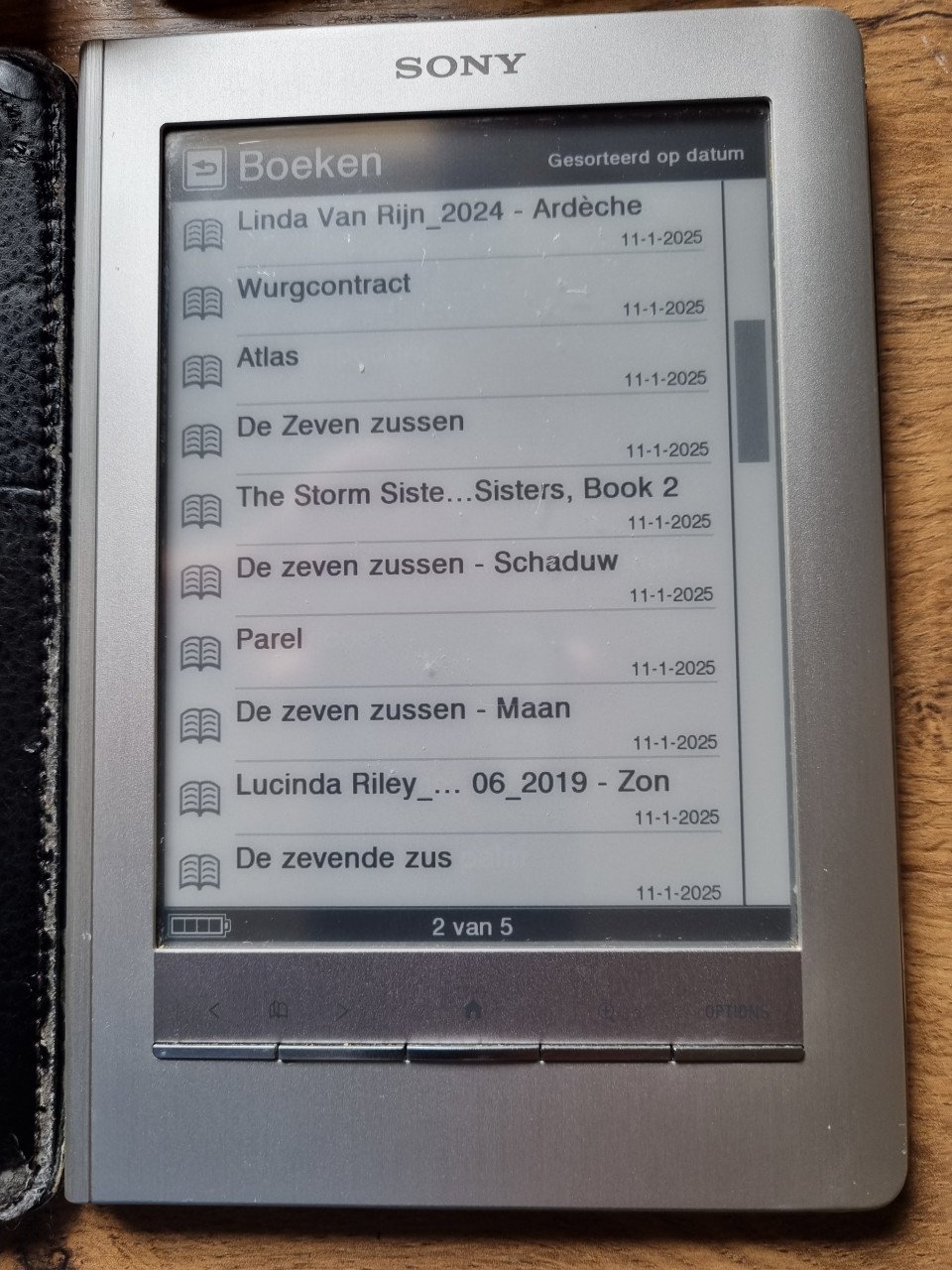 Sony E-reader PRS-600 inclusief oplader, hoes en veel boeken