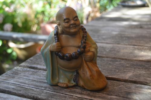 Mooi beeldje lachende Boeddha / Budai