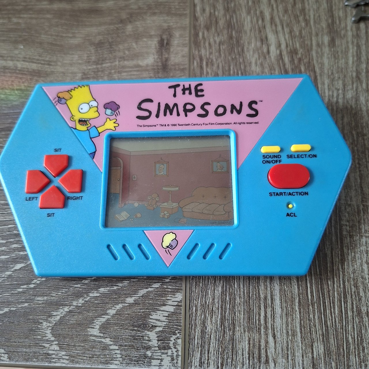 Vintage Acclaim The Simpsons  Handheld Video Game