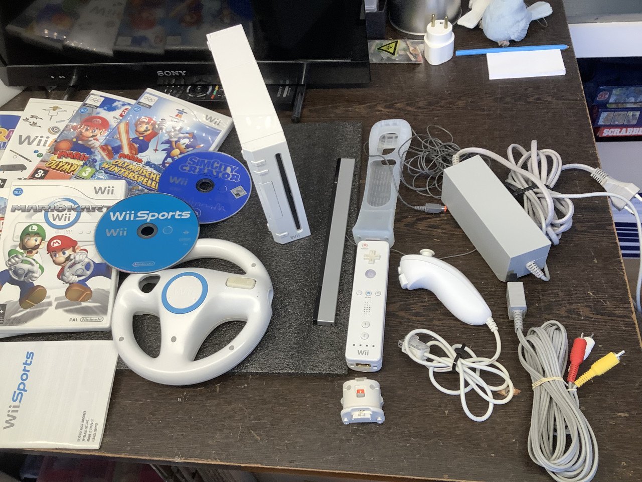 Nintendo Wii console met spellen en toebehoren. + Wii Fit balanceboard.