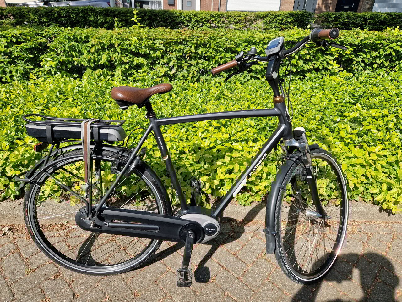 Keurig nette Batavus elektrische heren fiets met Bosch middenmotor