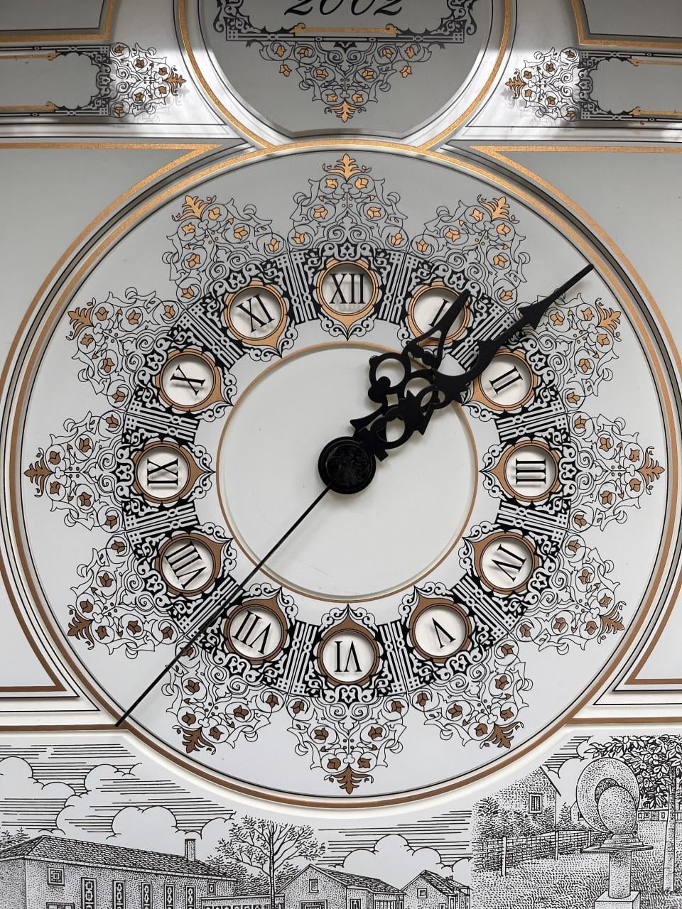 Wandklok met dorpsgezichten Hoedekenskerke