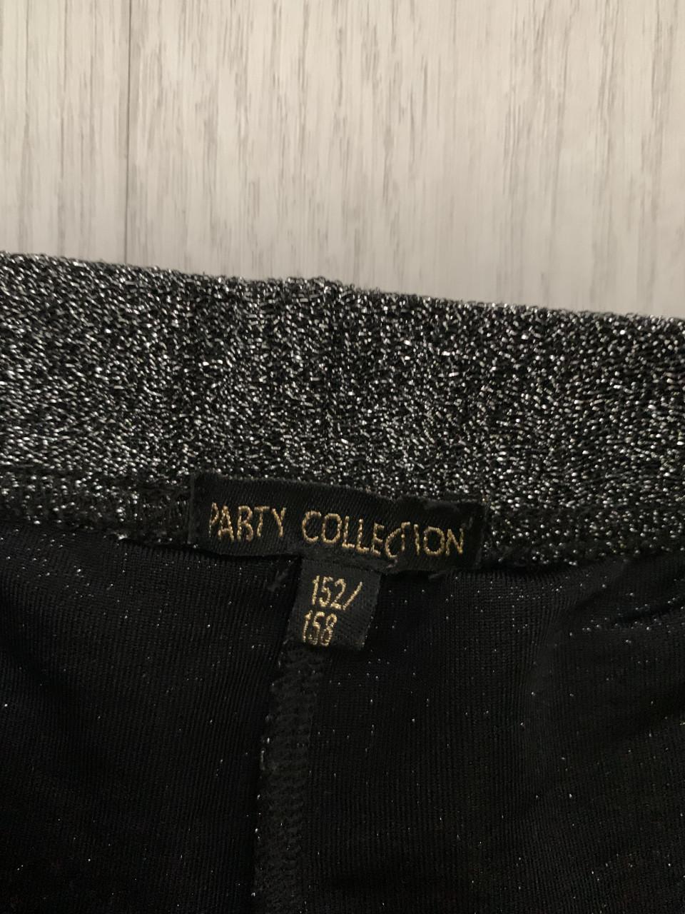 Flared broek met glitters maat 152/158