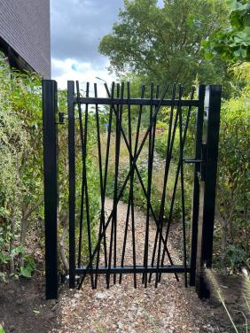 Tuinpoorten - Sierhekwerken en Inrijpoorten.