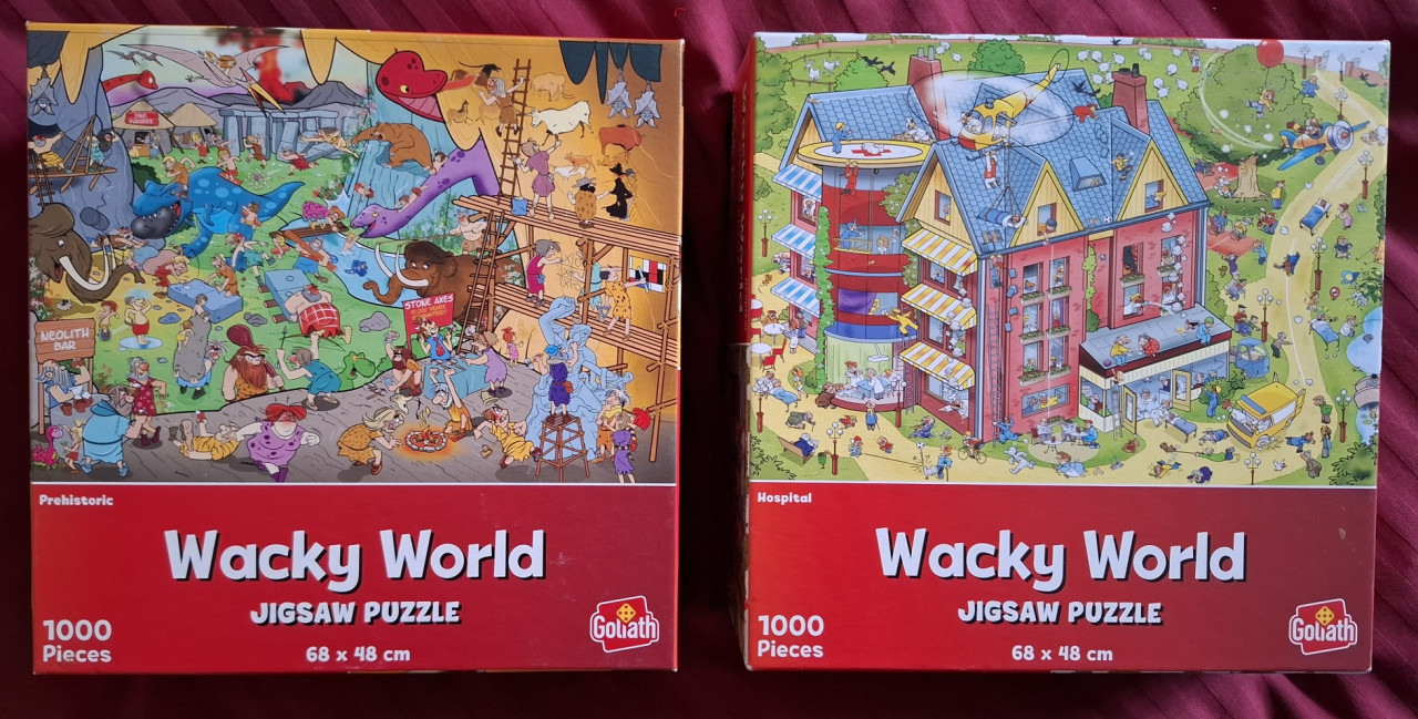 2 Goliath Wacky World legpuzzels en 1 WasGij legpuzzel, eenmaal gelegd