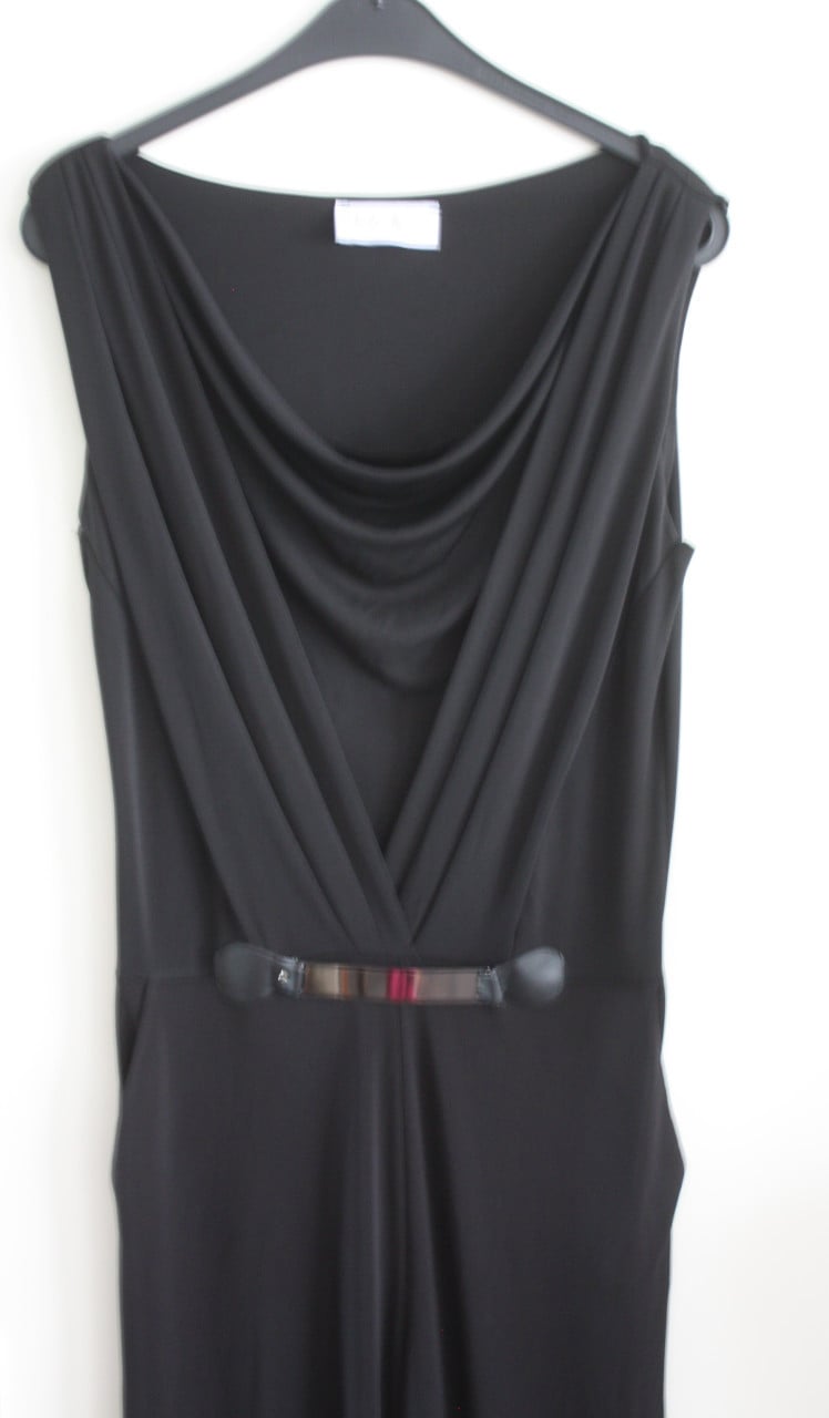 Zwarte jumpsuit met metalen detail maat L