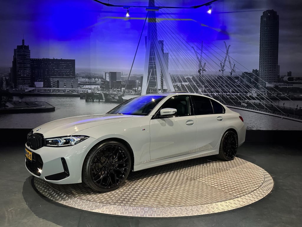 BMW 3-serie 318i m sport edition *schuifdak*shadow line*camera*laser*