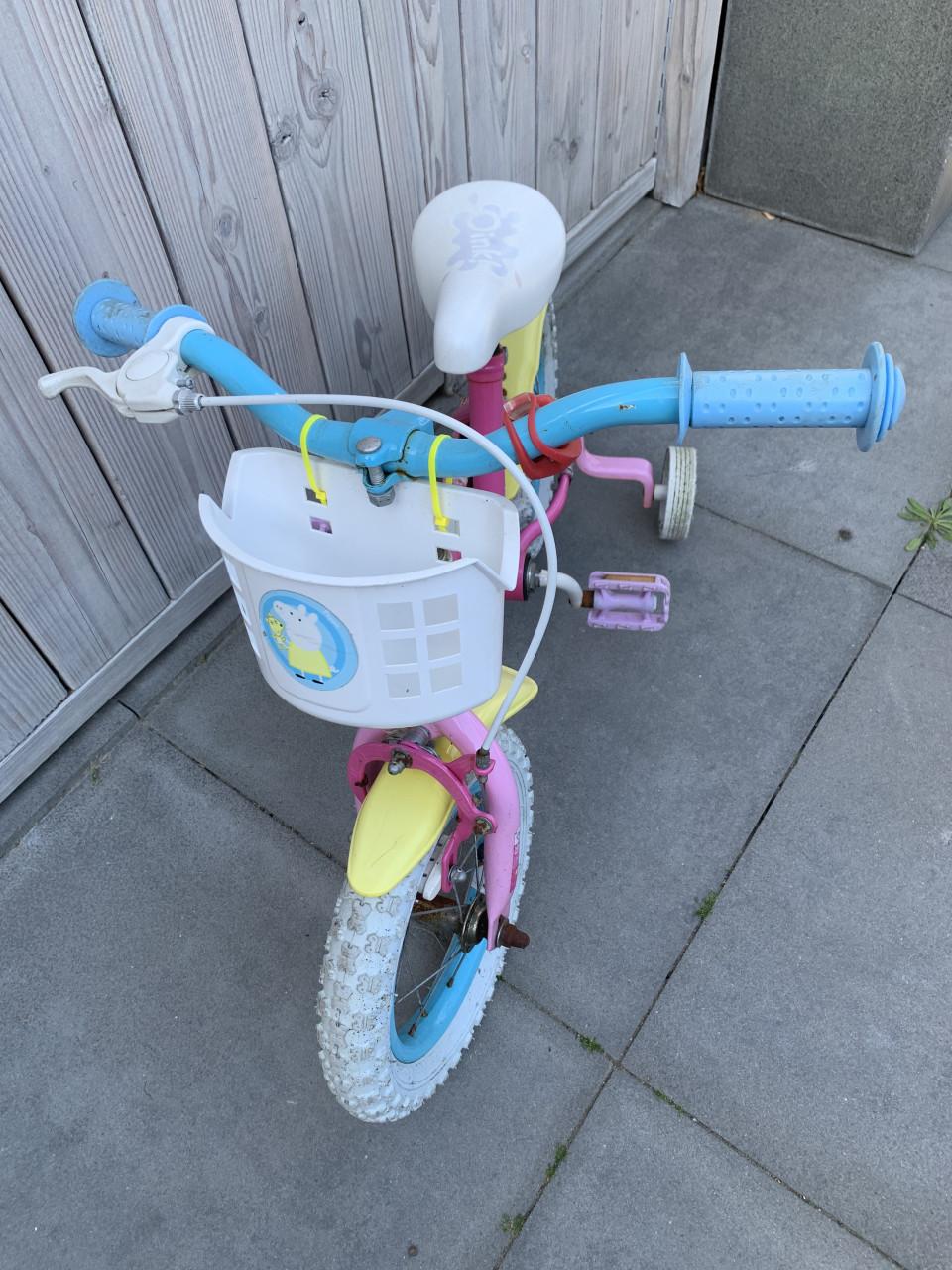 Roze kinderfiets met Peppa Pig 12inch met zijwieltjes