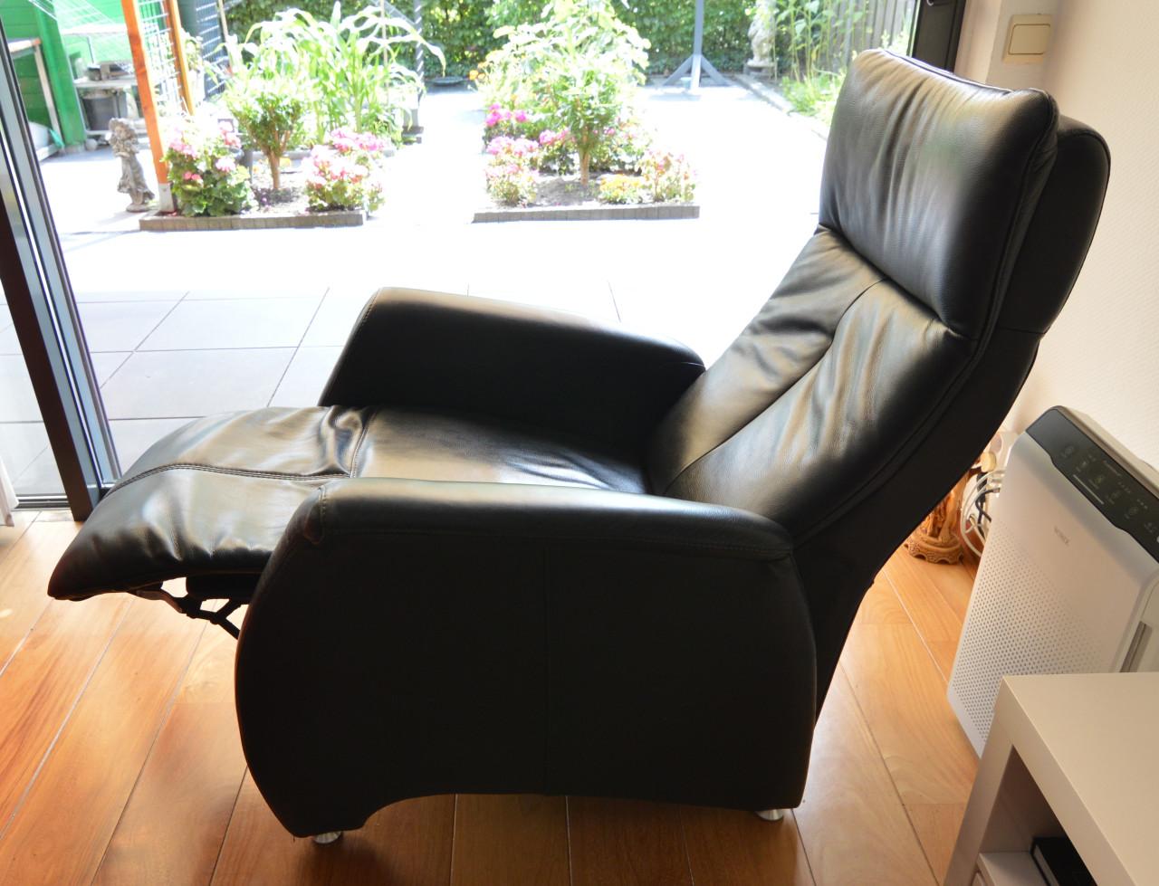 Uitklapbare lederen fauteuil