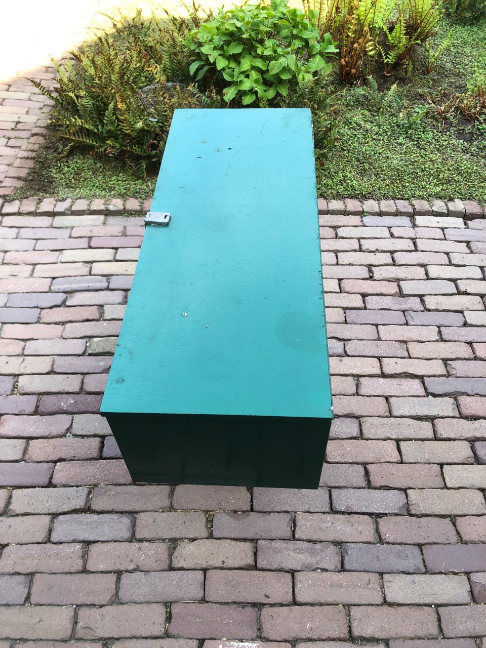 Groene houten kist.