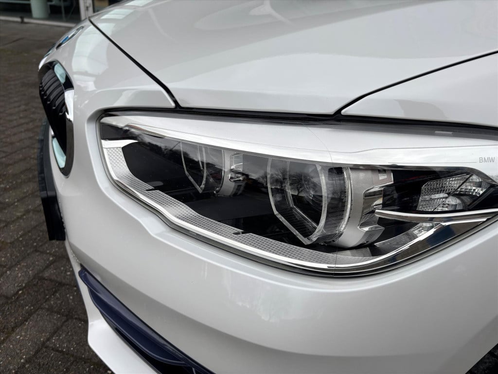 BMW 1 Serie (f20) 118i 136pk aut steptronic sport line | unieke km stand|ri