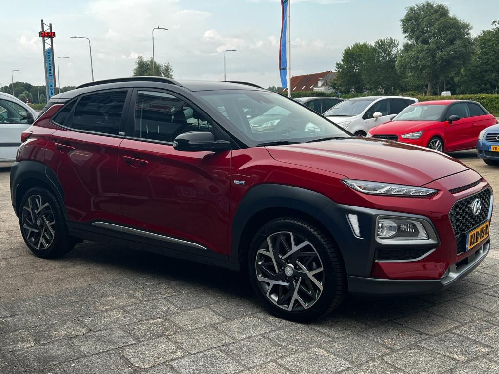 Hyundai Kona 1.6 gdi hev premium two tone, leer, camera, head up display en