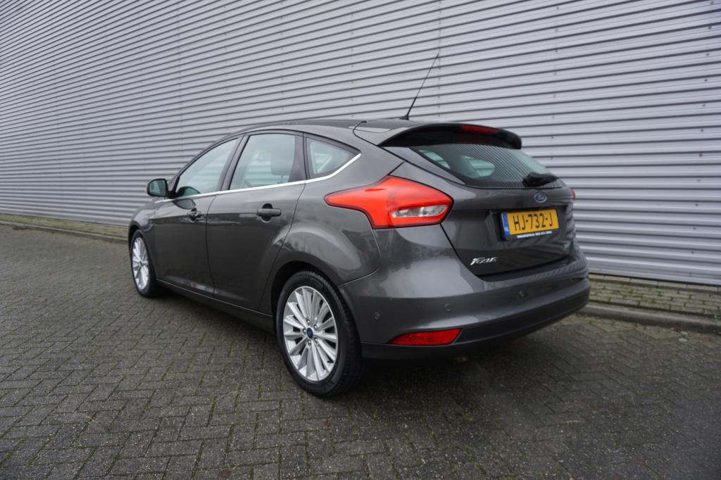 Ford Focus 1.0 titanium edition 1e eigenaar / navi / climate controle / cru