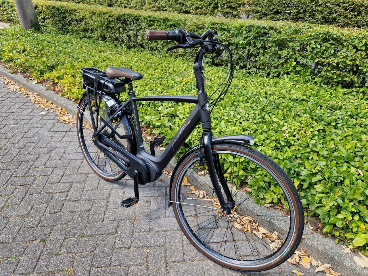 Keurig nette Gazelle Orange elektrische heren fiets met Bosch middenmotor
