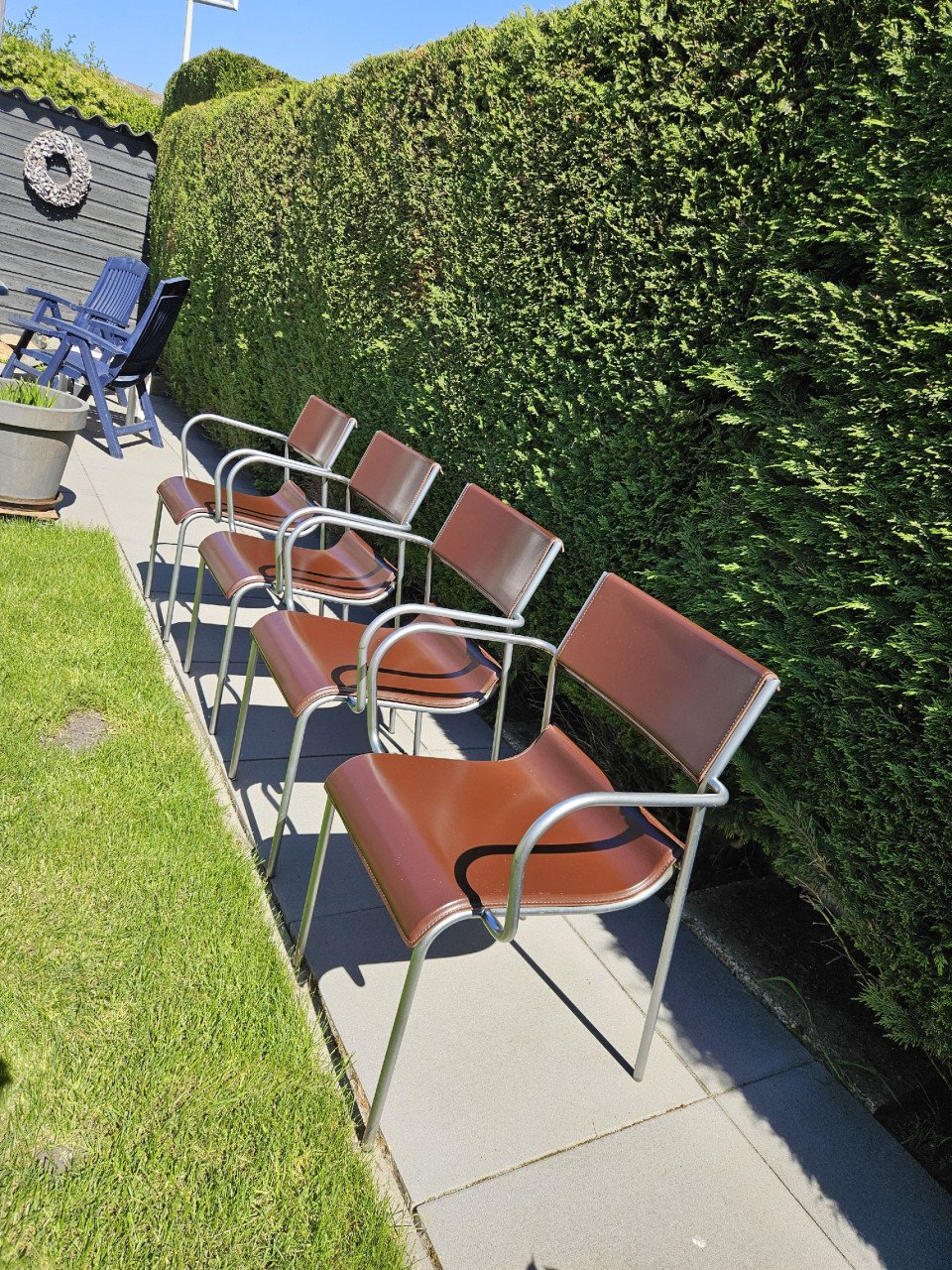 4 RVS en lederen eetkamerstoelen
