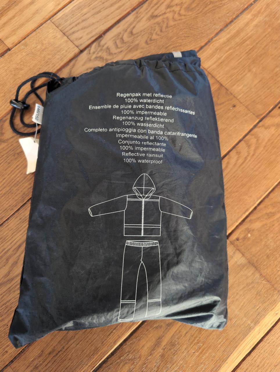 Gratis nieuw regenpak maat 146/152