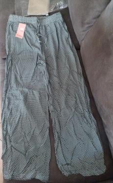 Nieuwe groen/wit gestippelde dames flaredbroek mt M/l