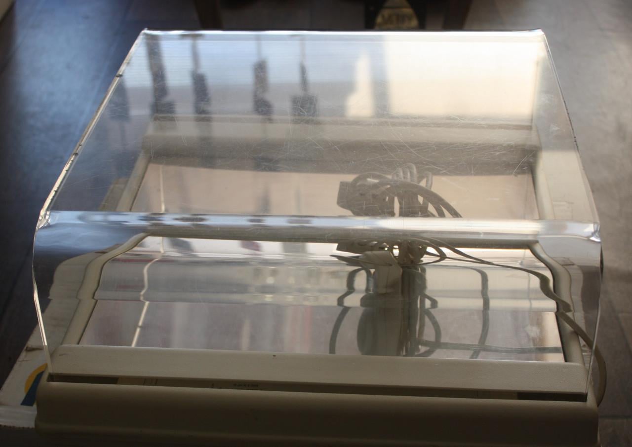 Methacrylaat podoscoop met groen licht.