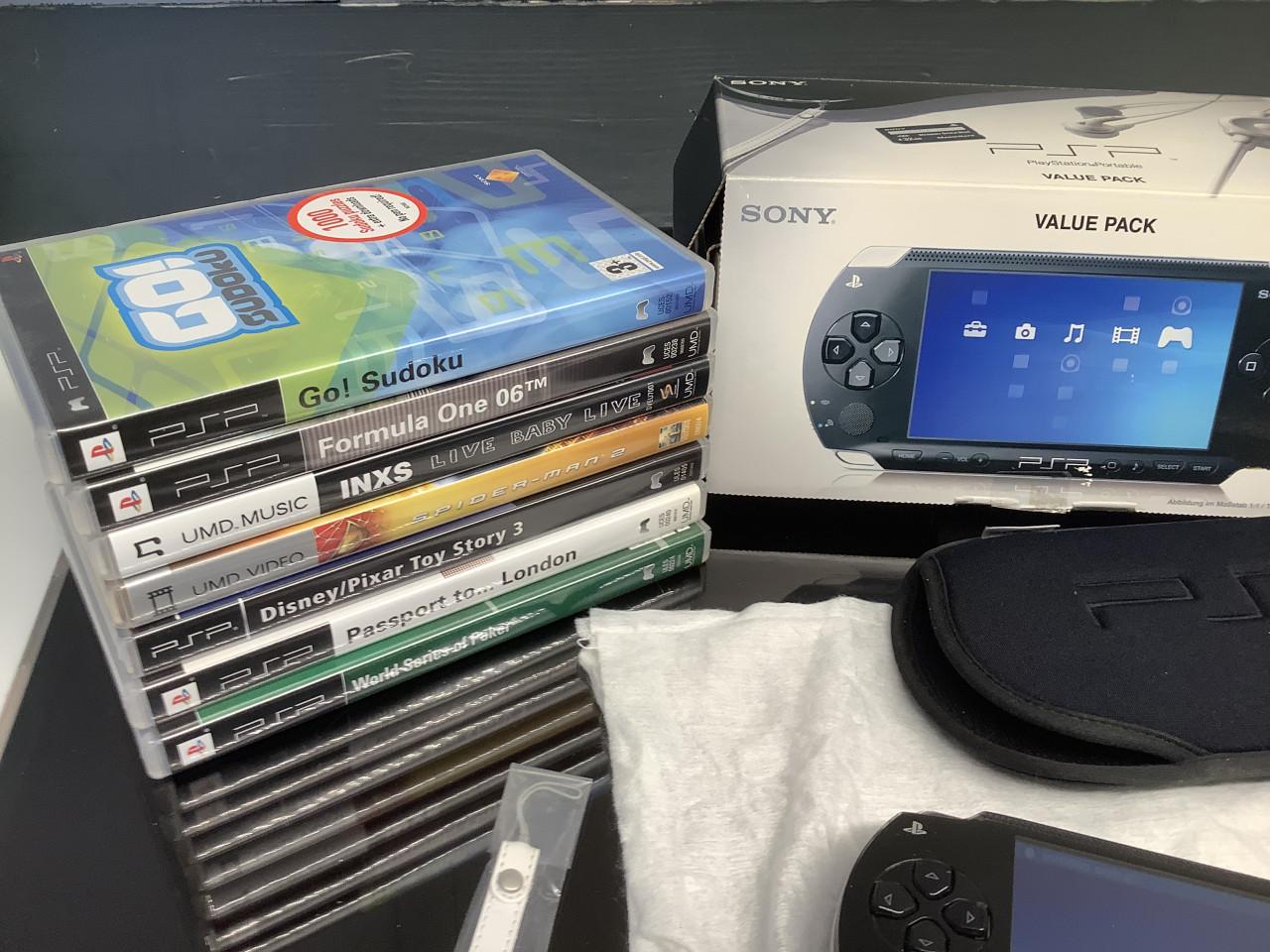 Sony PlayStation PSP1004 Value-pack compleet in doos en veel spellen.