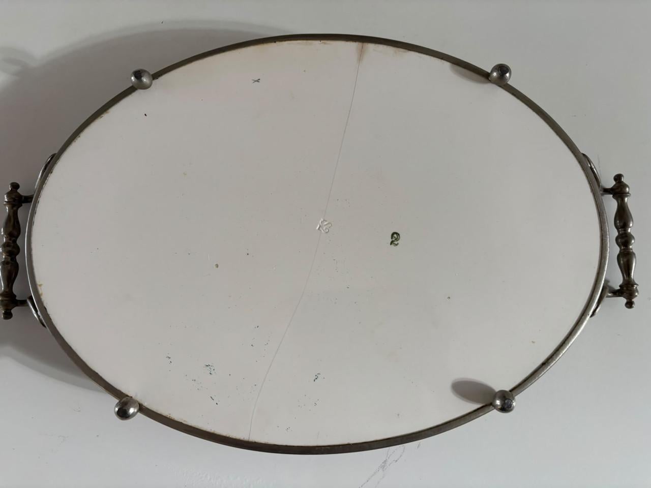 Antiek Ovaal dienblad met bloemmotief.