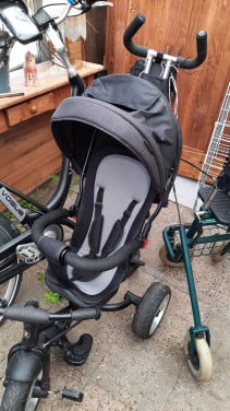 Driewieler met duw/stuur stang