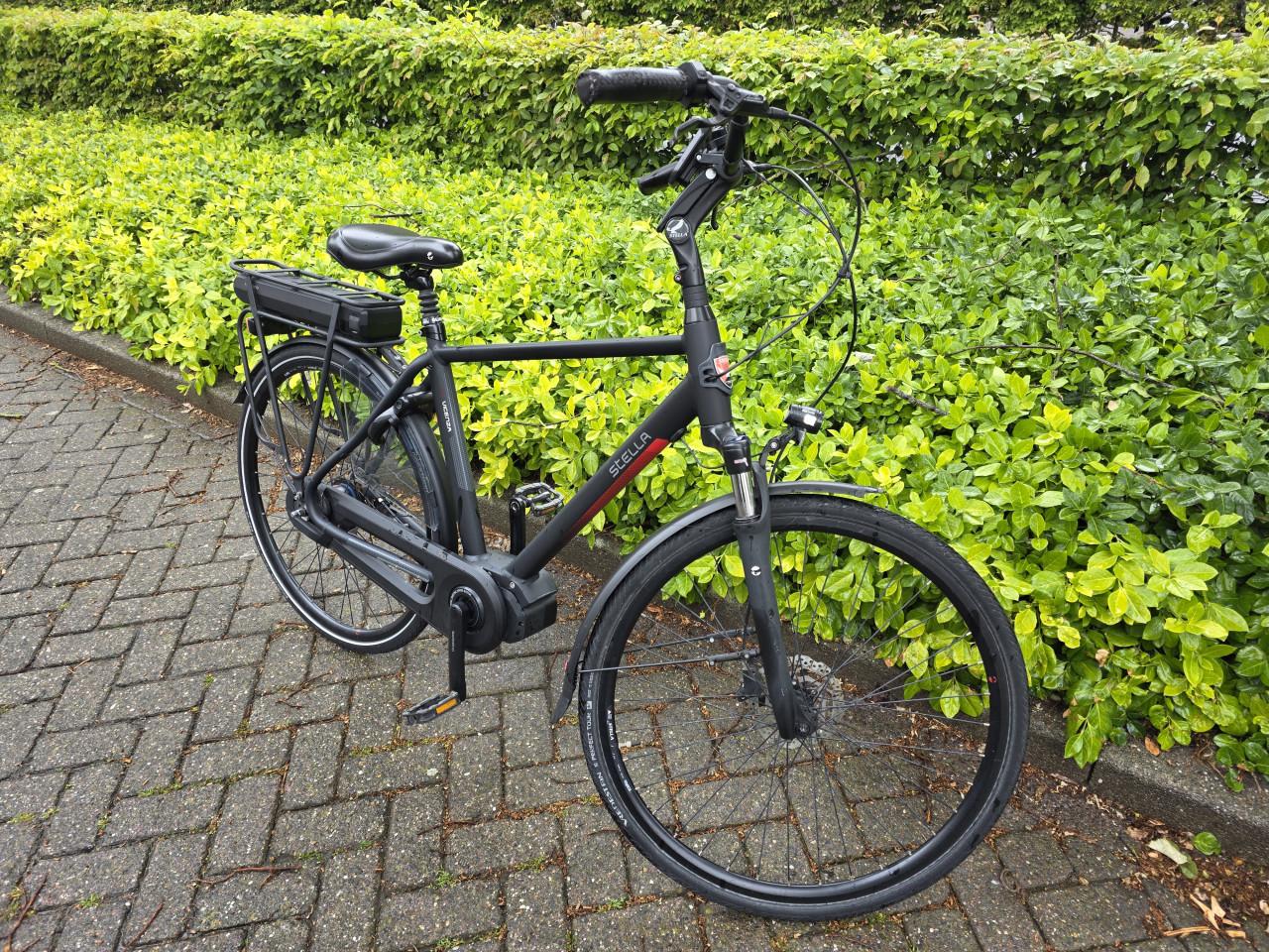 Keurig nette Stella elektrische heren fiets met Shimano middenmotor