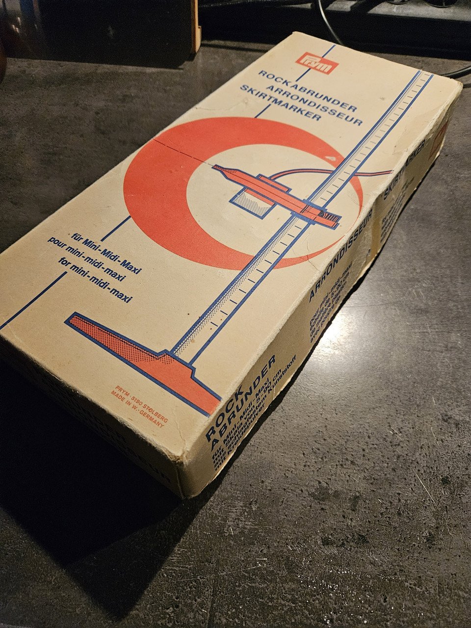 Mooie vintage prym rokzoommeter/rokspuit oranje, in originele doos