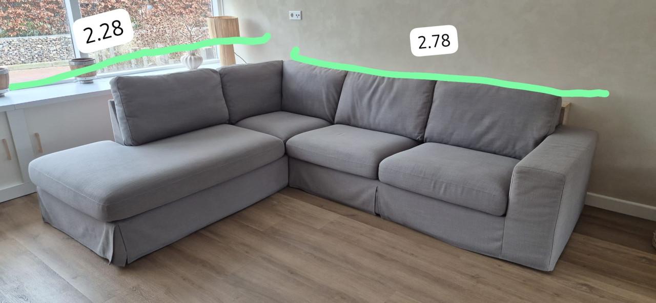 Grijze stoffen hoekbank