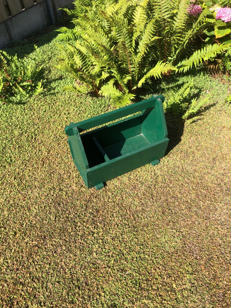 Groene houten bak.