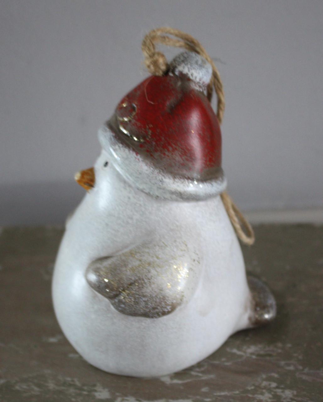 Stenen vogel hanger met bel