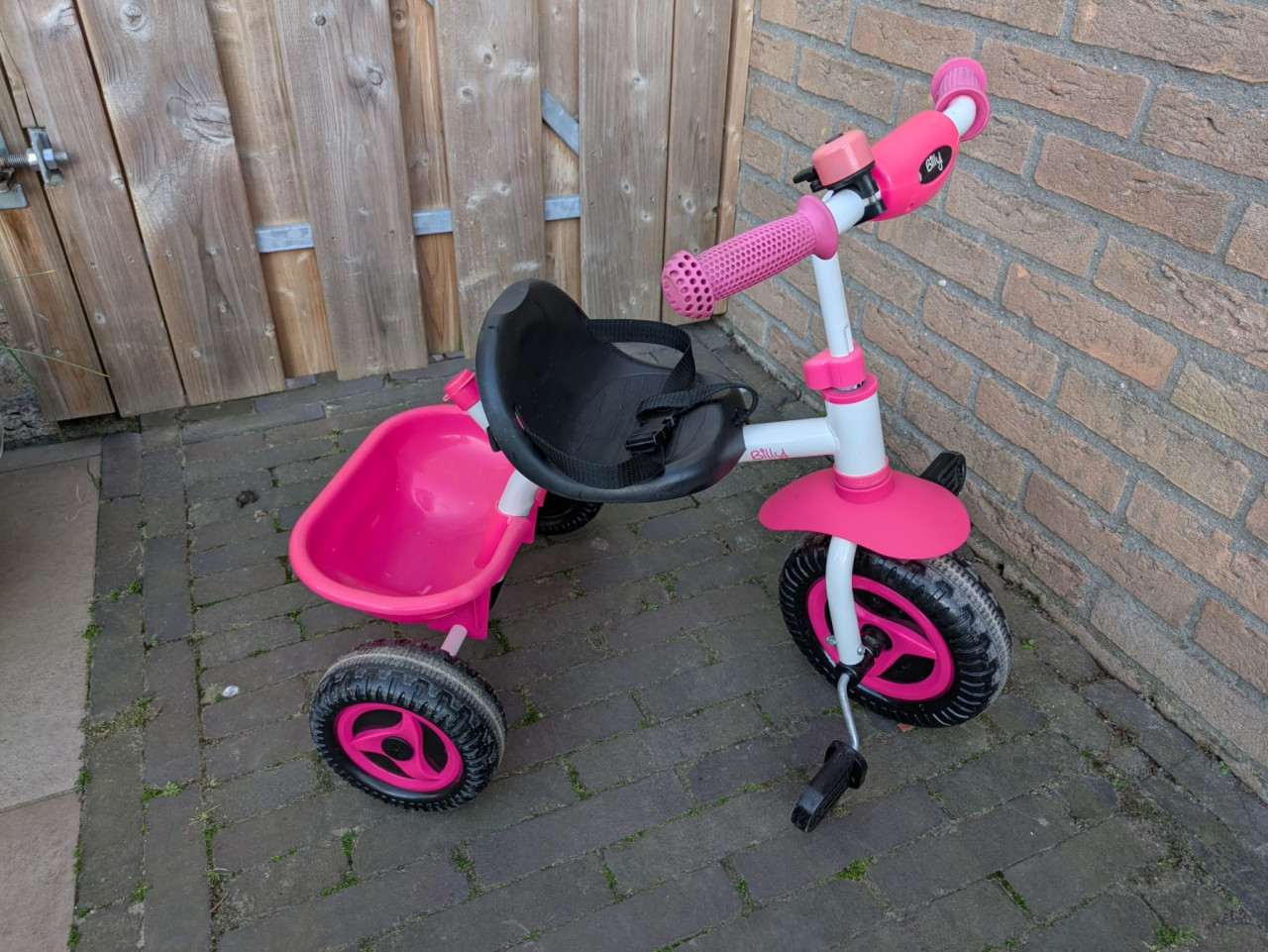 Driewieler met duwstang.