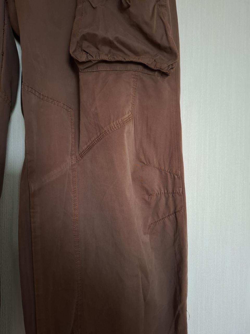 Didi broek met extra zakken en strikdetails. Bruin. Maat 44. Gedragen.