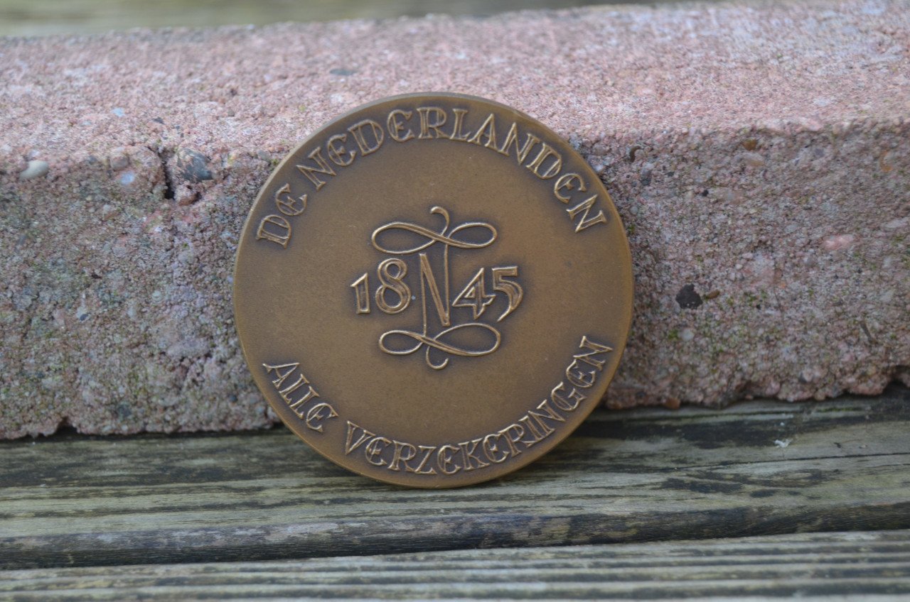 Bronzen penning verzekeringsmaatschappij