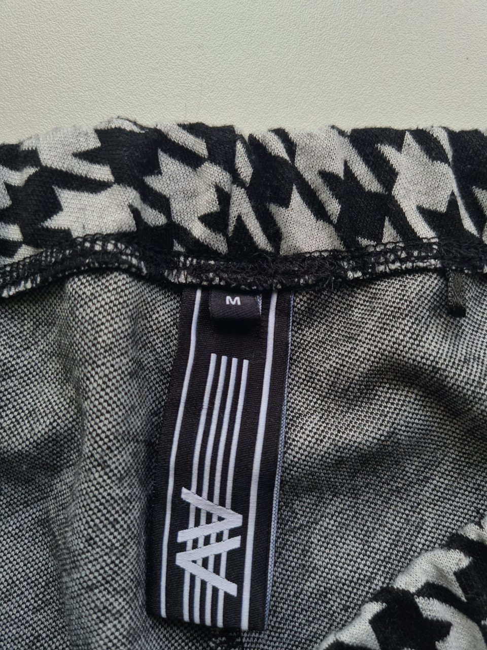 Nieuwe pied de poule zwart-wit broek met wijde pijpen van Amy & Ivy