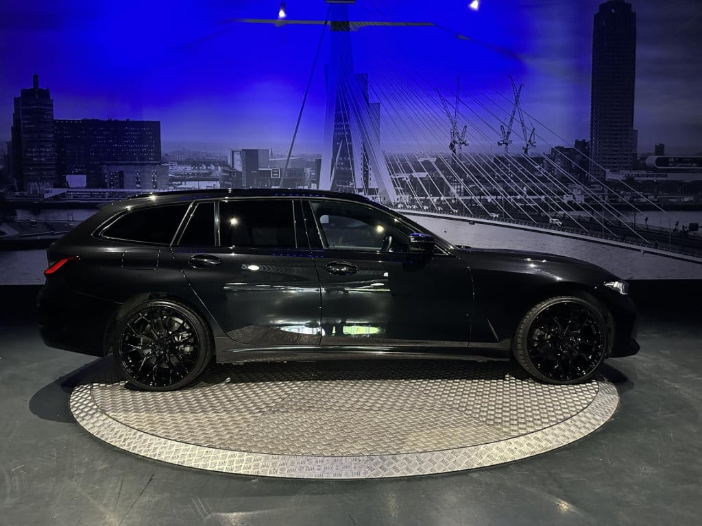 BMW 3-serie touring 330e xdrive *pano*360camera*sportstoelen*laser*