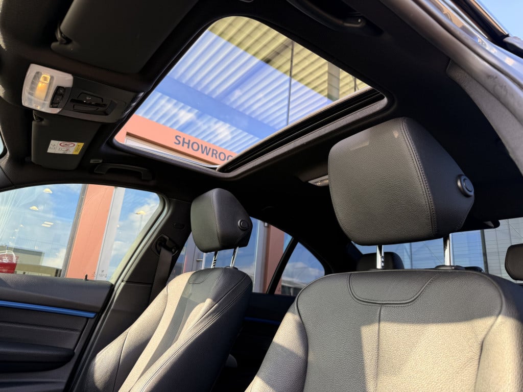 BMW 3-serie 320i m-sport | 360 camera | head-up | leder | schuif / kantel d